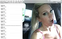 Blonde girl takes a selfie while driving